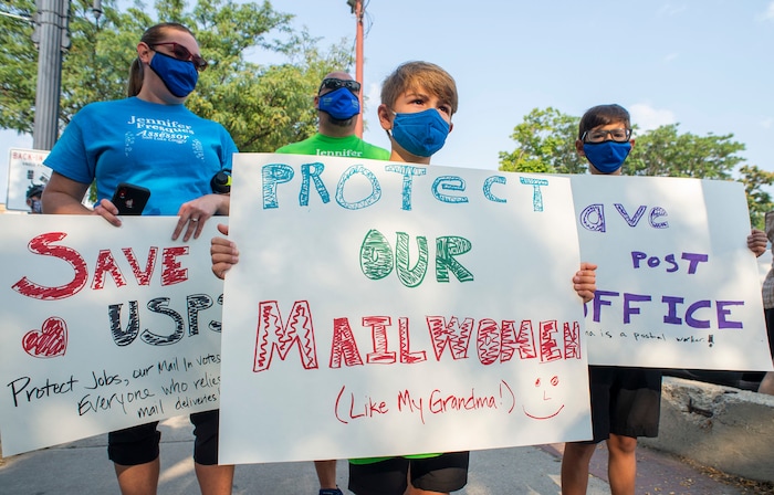 (Rick Egan | The Salt Lake Tribune) Protesters gather for a rally to "Save the Post Office," hosted by Alliance for a Better Utah, NAACP Salt Lake Branch, League of Women Voters at the Post Office on 200 South in Salt Lake City, Saturday, Aug. 22, 2020.